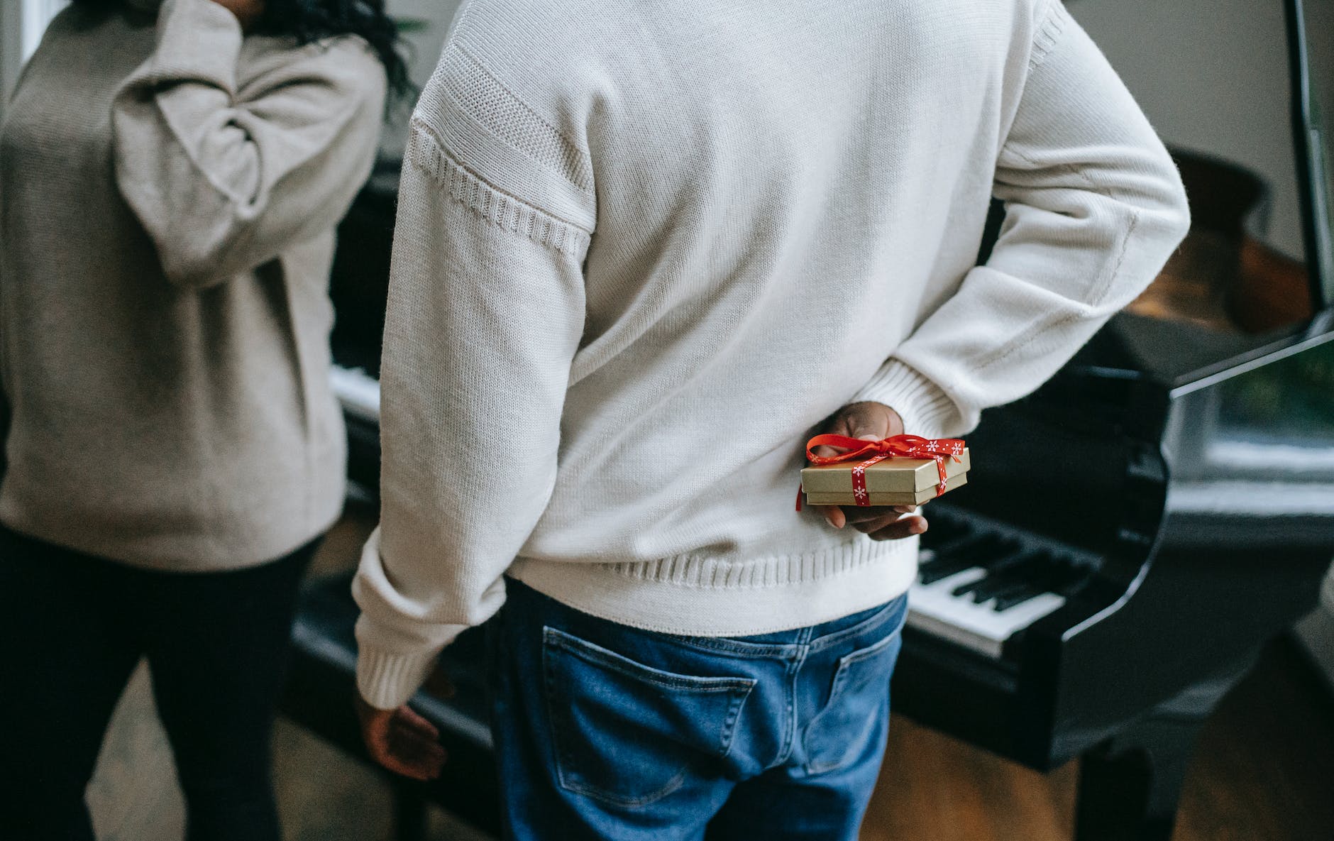 a person hiding a gift